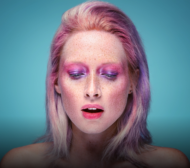 Studio portrait with pastel background